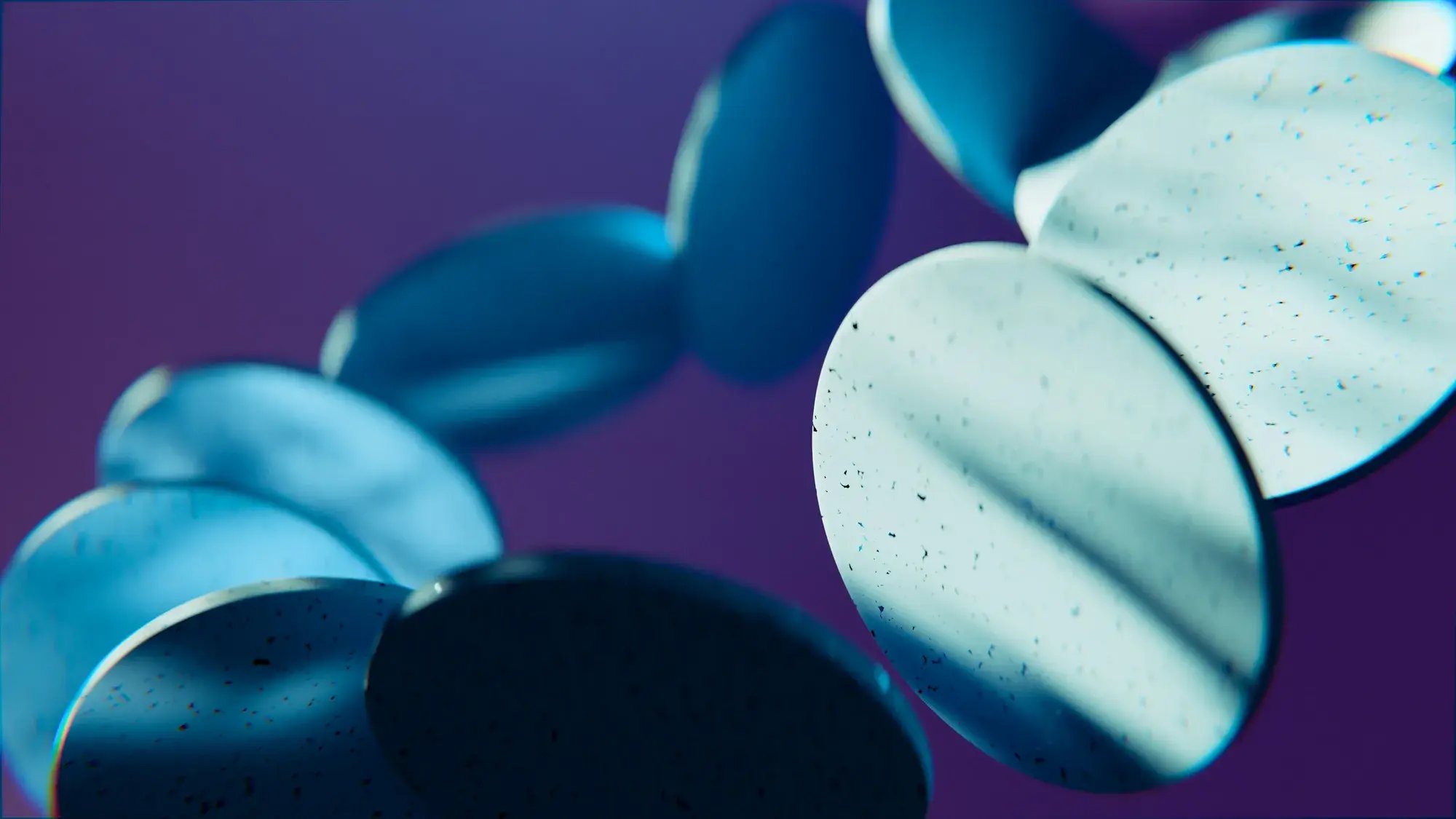Objets circulaires bleus sur fond violet